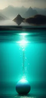 Underwater sphere with turquoise glow and mountain backdrop wallpaper.