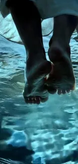 Feet dipping into tranquil blue water.