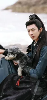 Warrior in traditional attire holding a dog by the seaside.