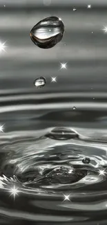 Close-up of a water droplet creating ripples on a metallic surface.