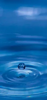 Serene blue water drop with ripples, ideal for calming phone wallpaper.