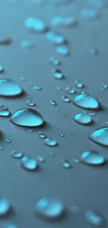 Close-up of blue water droplets on a surface, creating an abstract mobile wallpaper.