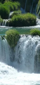 A stunning waterfall in a lush green forest.