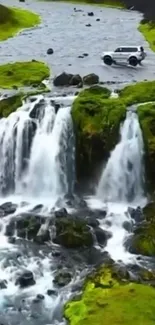 Adventure vehicle parked near a scenic waterfall amidst lush green landscapes.