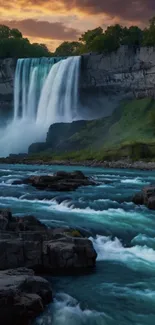 Cascading waterfall at sunset amid green foliage and rocks.