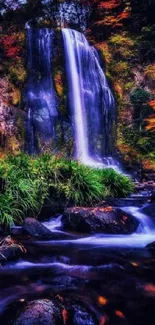 Serene waterfall surrounded by autumn foliage in a vibrant nature scene.