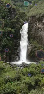 Waterfall with bubbles in lush green setting.