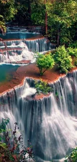 A serene forest waterfall with lush greenery.