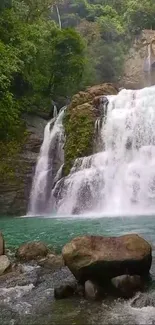 Beautiful waterfall amidst lush greenery, perfect for nature lovers.