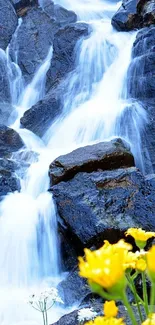 Tranquil waterfall with flowers and blue sky background.