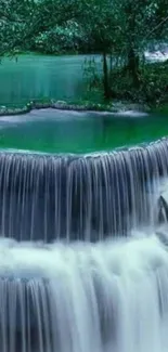 Serene waterfall with vibrant greenery.