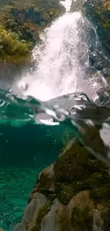 Serene waterfall cascading among rocks, surrounded by lush greenery.