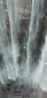 Cascading waterfall creating a serene mobile wallpaper.