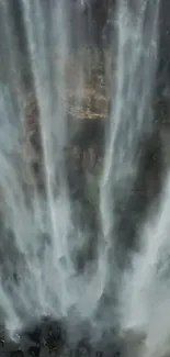 Majestic waterfall cascading down rocks.