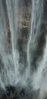 Serene gray waterfall in motion, displaying natural beauty.