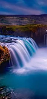 A serene mobile wallpaper of a majestic waterfall cascading through nature.