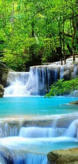 Serene waterfall with turquoise waters and lush green forest.