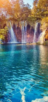 Serene waterfall with blue water and lush greenery in the background.