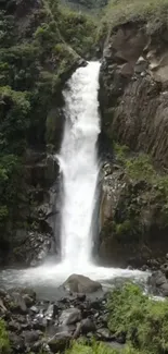 Serene waterfall cascading in a lush green landscape.