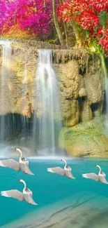 Swans glide gracefully on turquoise water beneath a vibrant waterfall.