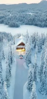 Snow-covered cabin nestled in a tranquil winter forest scene.