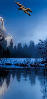 A blue sky over a snowy landscape with a bird in flight.