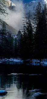 Snowy mountain with dark lake and forest reflection.