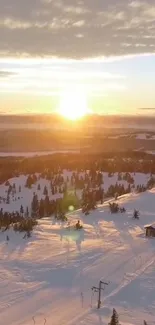 Breathtaking winter sunrise with snow-covered landscape and vibrant sky.