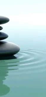 Calm zen stones on rippling water mobile wallpaper.