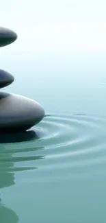 Minimalist mobile wallpaper with Zen stones and tranquil water ripples.