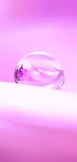 Pink mobile wallpaper with water droplet on soft background.