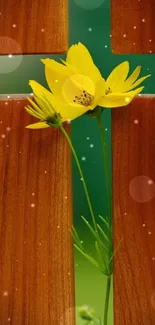 Yellow flowers against a wooden cross background on mobile wallpaper.