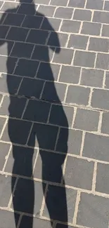 Brick wall with shadow effect, minimalist design.