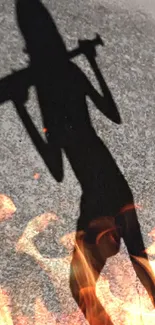 Shadow silhouette of a person carrying an object on a dimly lit sidewalk at night.