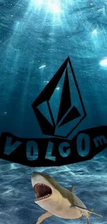 Underwater scene with shark and Volcom logo.