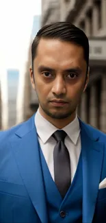 Man in a sharp blue suit with an urban backdrop.