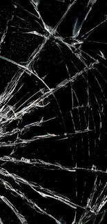 Shattered glass pattern on a black background creating a dramatic and edgy look.