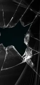 Shattered glass design with dark tones for mobile wallpaper.