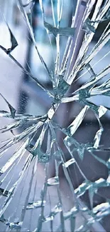 Shattered glass pattern on mobile wallpaper, creating a modern abstract design.