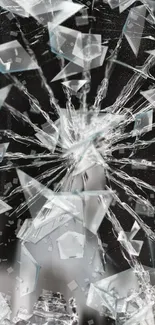 Shattered glass design on a mobile screen wallpaper.