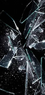 Shattered glass shards on a black background mobile wallpaper.