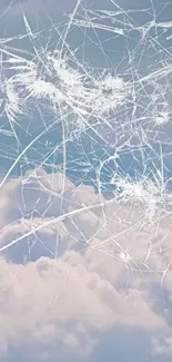 Shattered glass effect over a cloudy sky background.