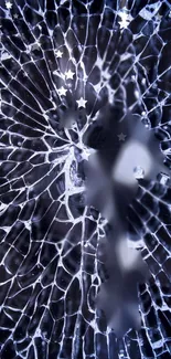 Abstract shattered glass design with stars on a dark blue background.