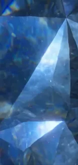 Shimmering blue gemstone with faceted design.