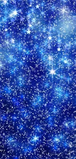 Blue starry sky wallpaper with sparkling stars.