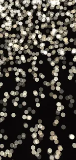 Shimmering bokeh light pattern on a dark mobile wallpaper.