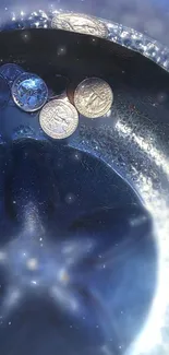 Coins reflecting light in a blue and metallic artistic setting.