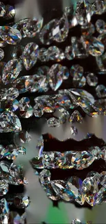 Shimmering diamond crystal texture on black background wallpaper.