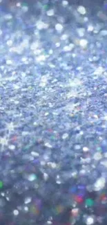 Blue sparkling glitter wallpaper with shimmering texture.