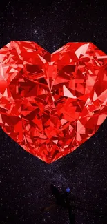 Red crystal heart against galaxy backdrop.